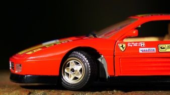 racing cars with different logos as a miniature model