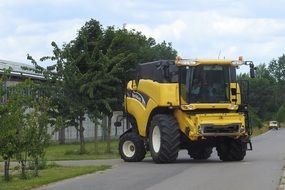 yellow combine harvester