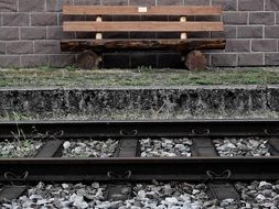 bench on a platform on a railway Station