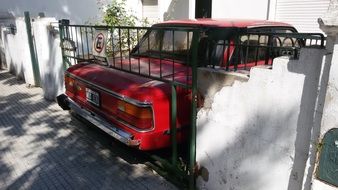 Car parking near the fence