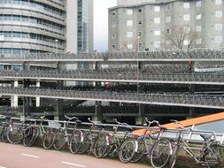 bicycles in a parking lot in amsterdam