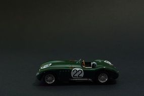 green vintage car as a miniature model