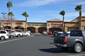 picture of the shop and parked cars