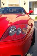 headlights of red Ferrari car