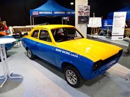 old yellow blue racing machine