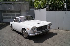 white retro car Lancia