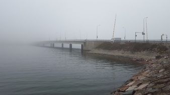 landscape of a bridge in fog in Helsinki