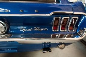 rear view of a blue vintage car close-up