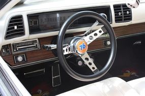 Interior of the auto with the steering wheel