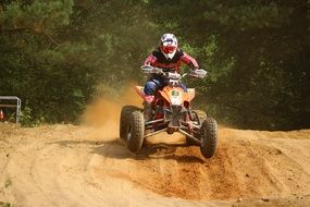 Motocross on a sand in forest