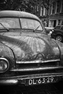retro car on amsterdam street close up