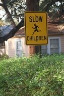 road sign warning of children on the road