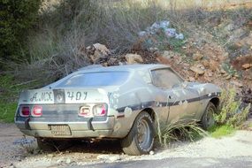 old dirty car in the countryside