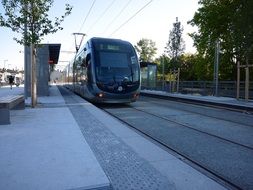 Tram at a train station in France