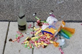 trash after a party on a city street