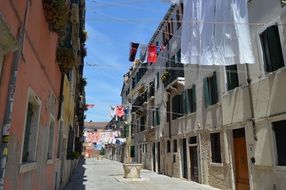 narrow street in venice on a sunny day