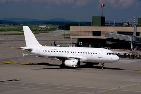 white airbus a319 at Zurich airport