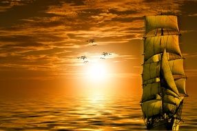 sailing ship on golden sunset background