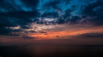 dramatic sunset over the fishing pier