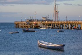 boat on the background of the pier in Swanage bay