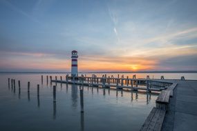 distant view of the lighthouse on the pier