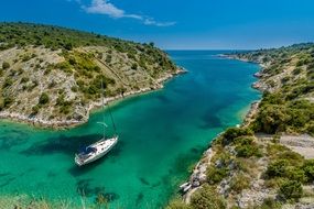 boat sailing in clear water