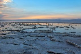 ice on ocean at dusk