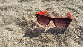 sunglasses in the sand