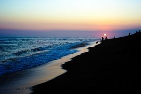 Romantic atmosphere on a beach at the sunrise