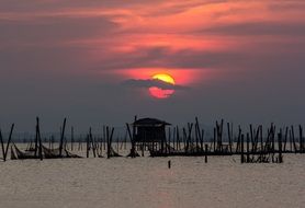 Red Sun over the water