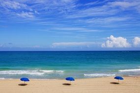 Blue Umbrellas on a beach