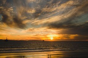coastal sunset in the clouds