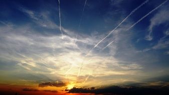 contrails in the evening sky