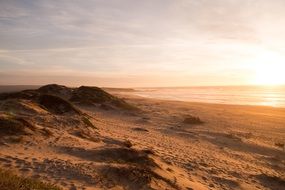 sunset on a sandy beach