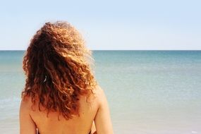 girl looks at the horizon