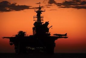silhouette of aircraft carrier