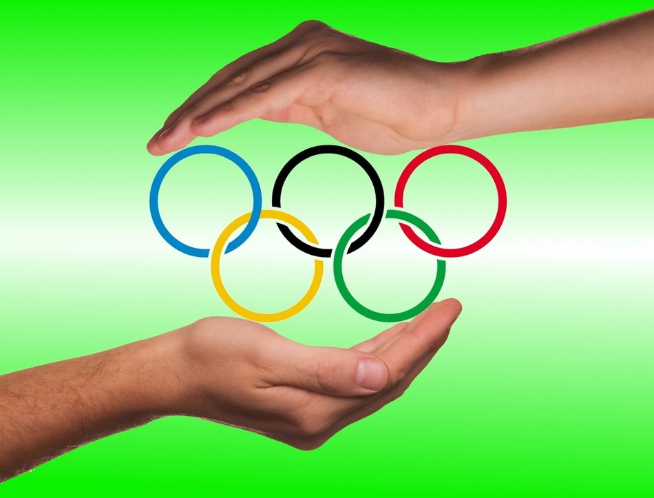 Olympic rings protected by hands