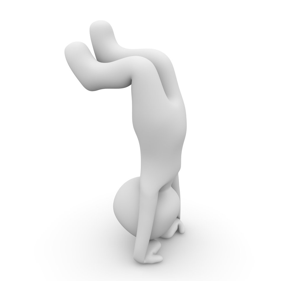 figure in movement on his head