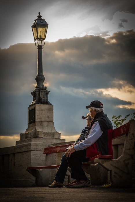 elderly couple near the lantern in budapest
