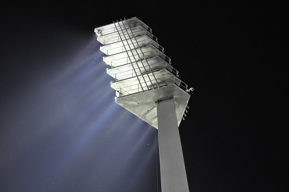 high spotlight on a soccer field at night