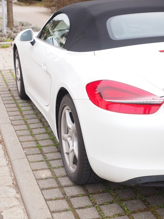 taillight of a white Porsche closeup