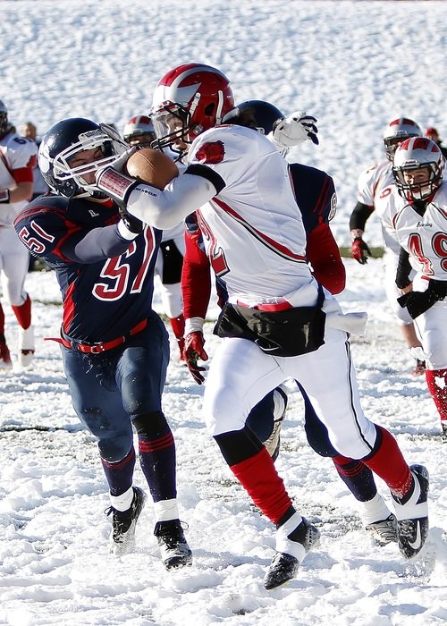 american football in the snow, canada