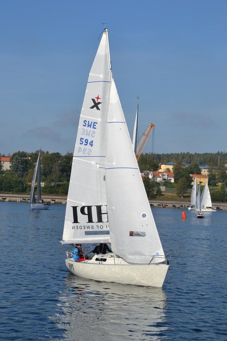 Sailboats at Racing in view of harbour, sweden