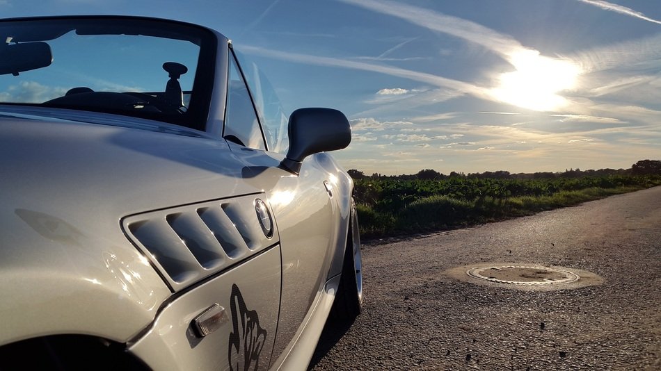 sports car on the road to Zandvoort in the summer sun