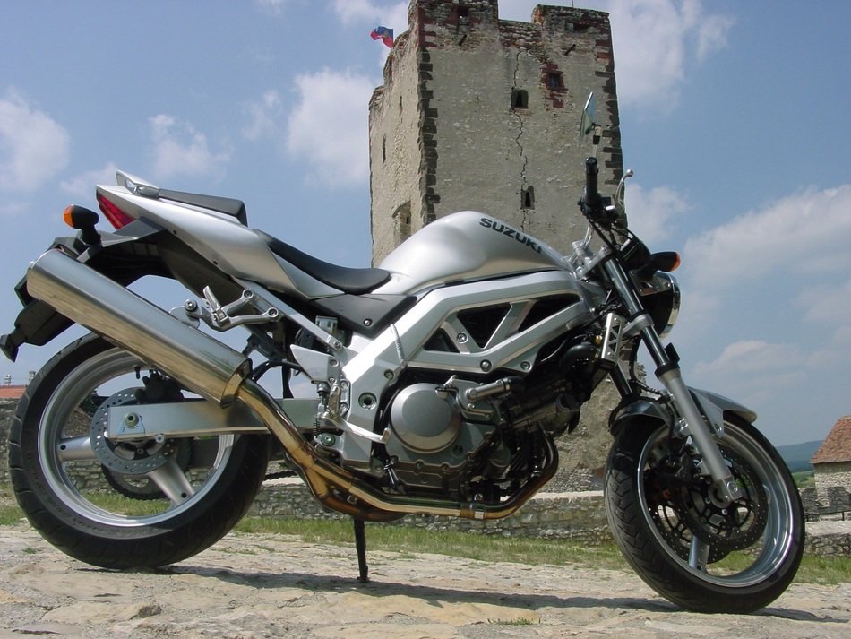 motorcycle stands on the background of the tower