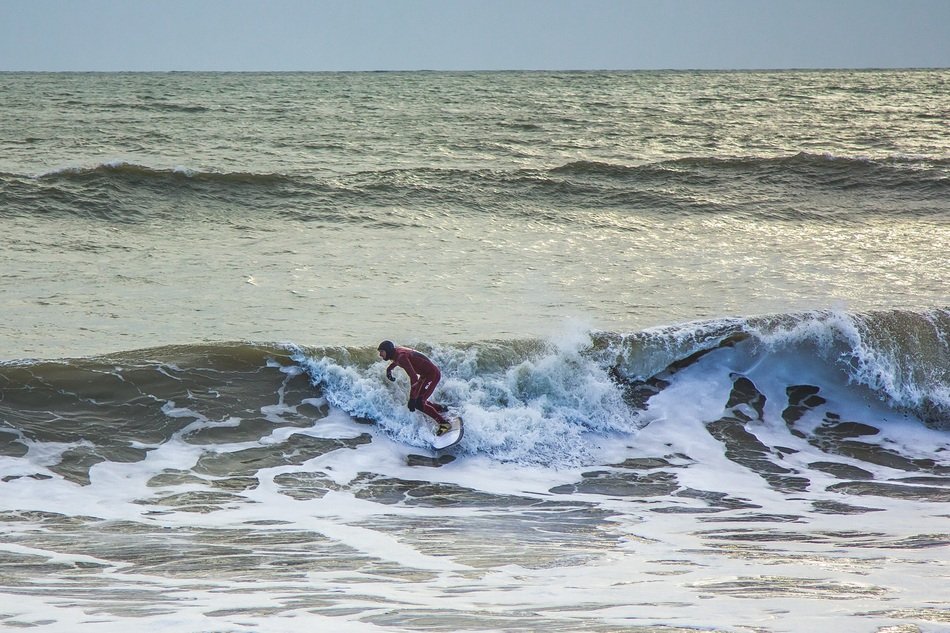 surfer on the wave in the ocean