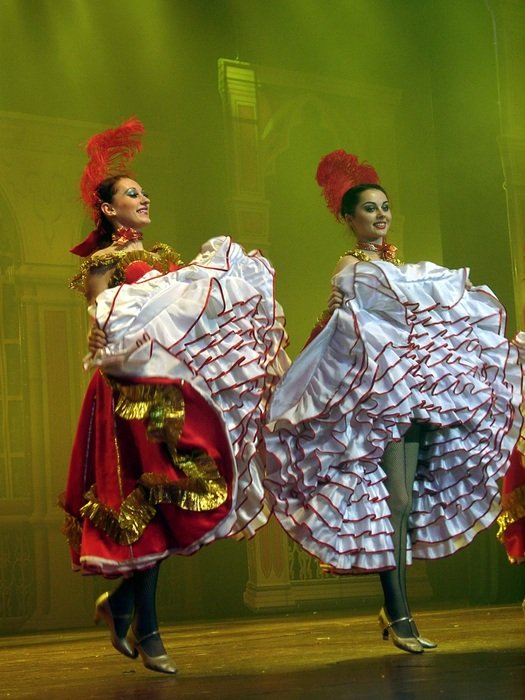 two Dancing women with Skirts up, cabaret performance