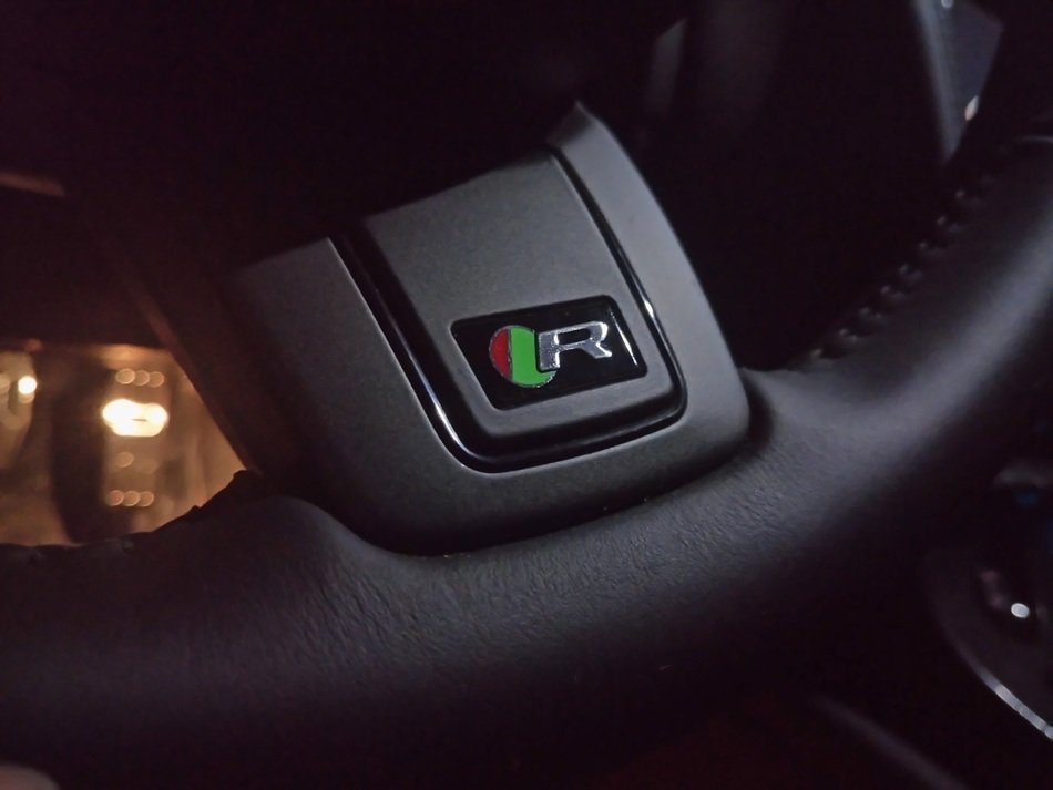 button of a steering of a car jaguar
