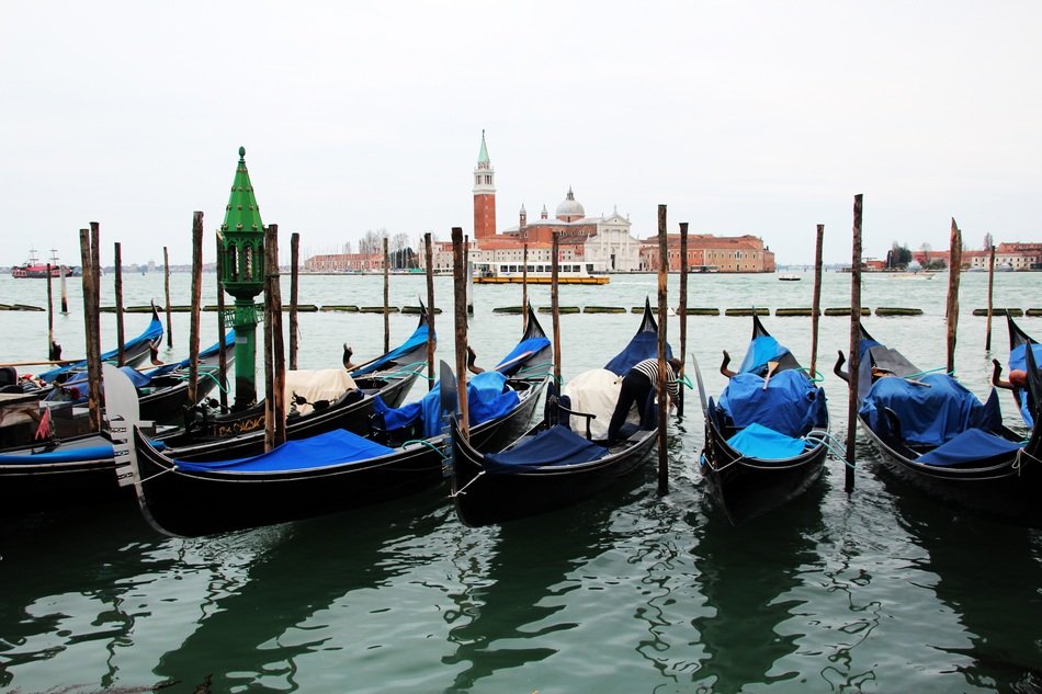 gondolas in a parking at the port of venice