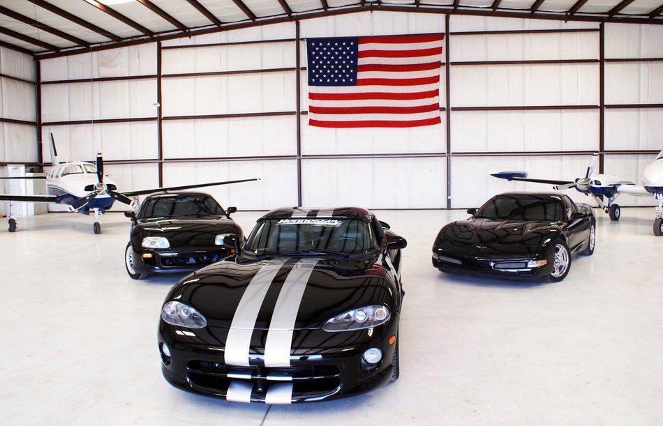 black corvettes on the background of the american flag